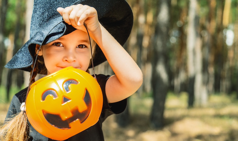 girl in witch costume