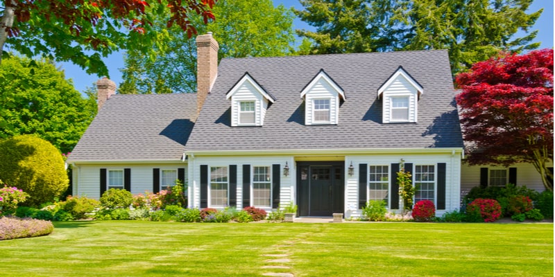 A house with a gutter guard system installed on a home