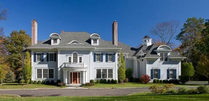 Leafguard gutters shown on a large victorian home